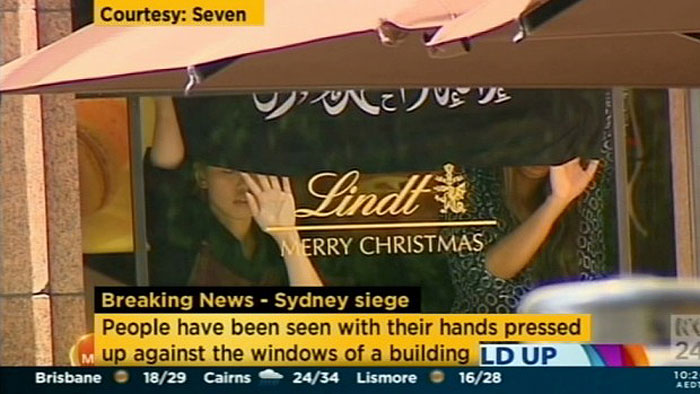 Desconocido con bandera islámica retienen a rehenes en una cafetería de Sydney