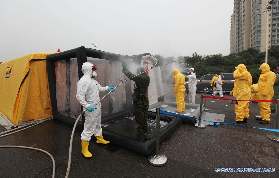 Identifican químicos almacenados en bodega de Tianjin que estalló