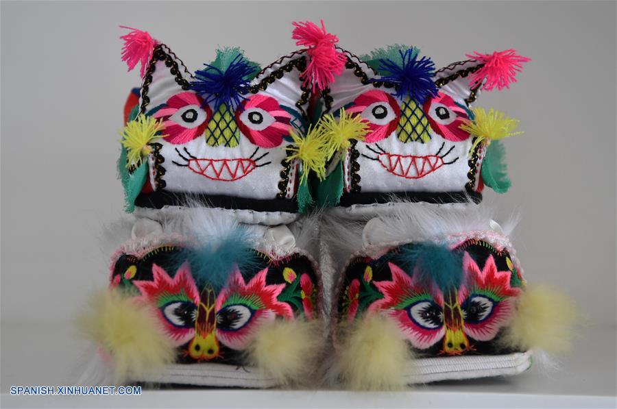 Calzado con cabeza de tigre: Artesanía tradicional popular china