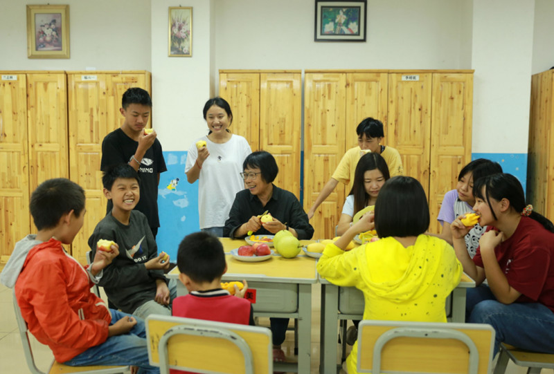 Zhang en la escuela. (Foto: Yunnan Daily)